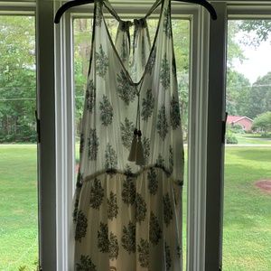 White romper with design